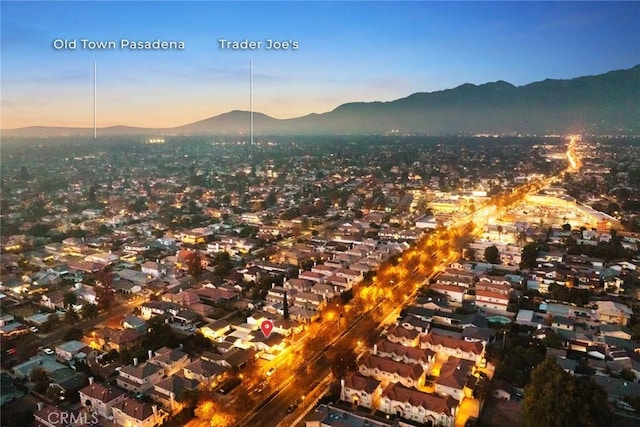 aerial view at dusk with a mountain view