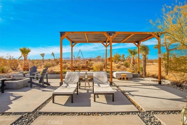 59427 La Crescenta Dr, Yucca Valley, CA 92284 - view of patio featuring a pergola and a fire pit