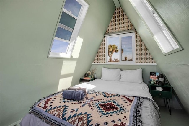 bedroom featuring vaulted ceiling