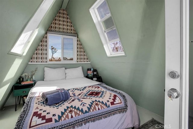 59427 La Crescenta Dr, Yucca Valley, CA 92284 - bedroom featuring multiple windows and lofted ceiling with skylight