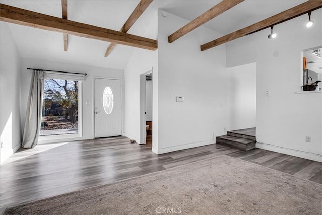 59427 La Crescenta Dr, Yucca Valley, CA 92284 - foyer entrance featuring wood finished floors, beamed ceiling, baseboards, and high vaulted ceiling