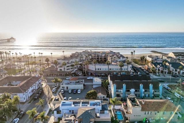 drone / aerial view with a view of the beach and a water view