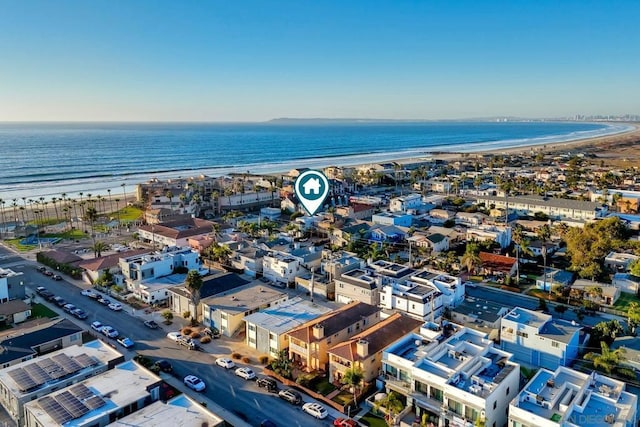 aerial view featuring a water view and a view of the beach