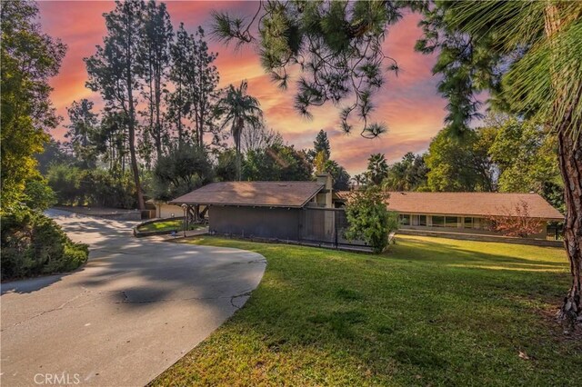 view of front of home featuring a yard