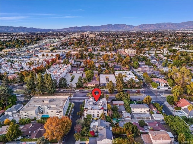 drone / aerial view featuring a mountain view