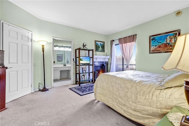 carpeted bedroom with connected bathroom