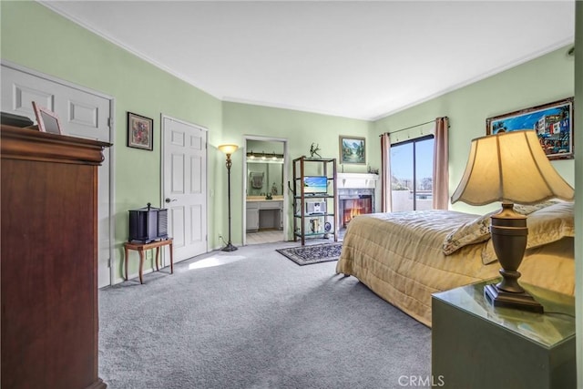14326 Chandler Blvd Unit 5, Sherman Oaks, CA 91401 - bedroom with ornamental molding, carpet, ensuite bath, and access to exterior