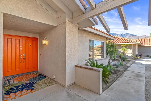 property entrance featuring a mountain view