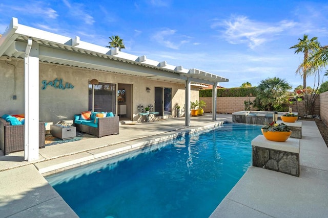 view of swimming pool featuring an in ground hot tub, an outdoor living space, and a patio