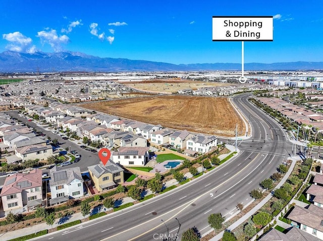 aerial view featuring a residential view and a mountain view