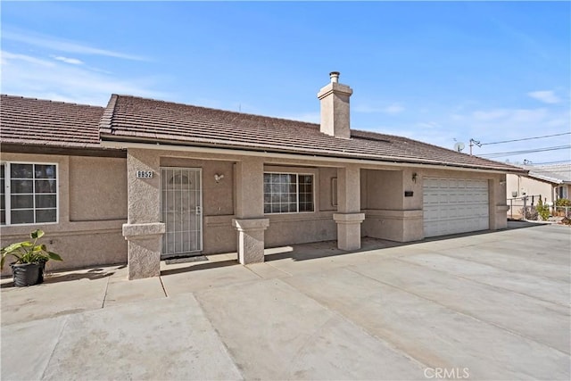 ranch-style house with a garage