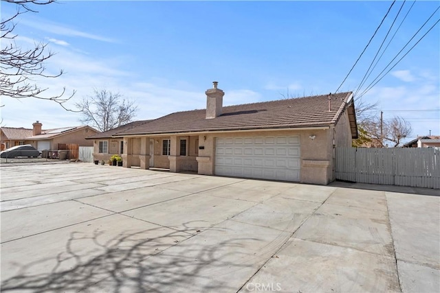 single story home featuring a garage