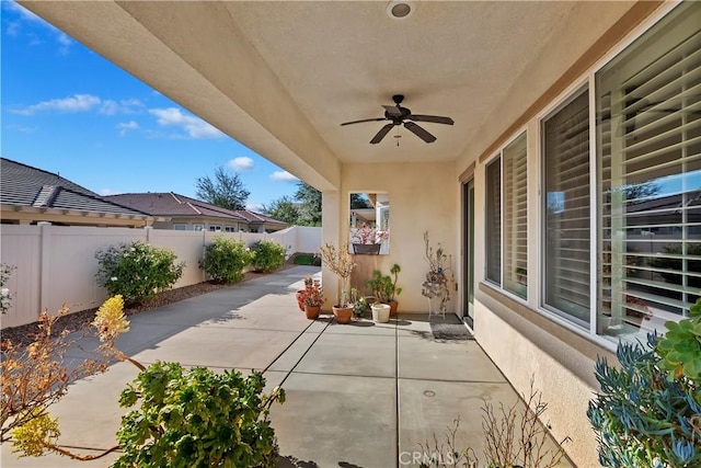 view of patio with ceiling fan