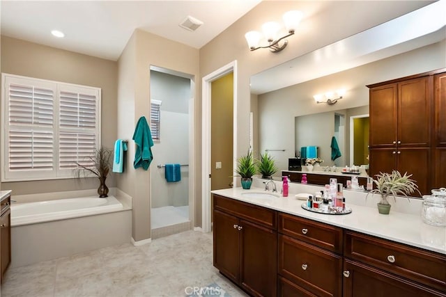 bathroom featuring a bathtub and vanity