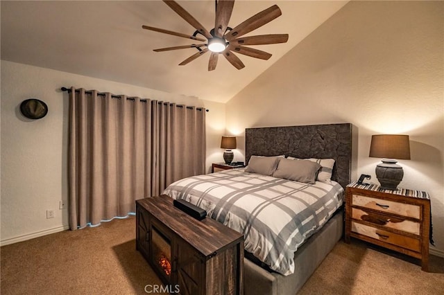 bedroom featuring ceiling fan, vaulted ceiling, and carpet floors