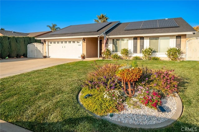 single story home featuring a garage, a front lawn, and solar panels