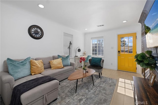 living room with light hardwood / wood-style flooring