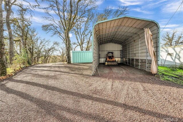 view of car parking featuring a carport