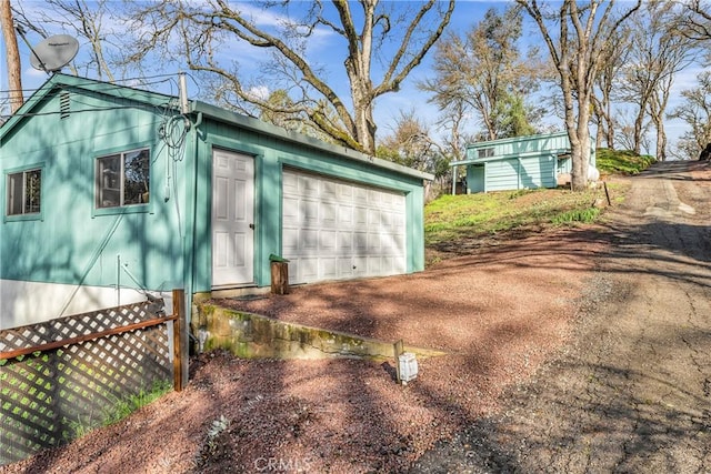 exterior space featuring a garage