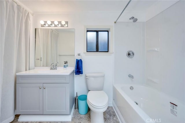 full bath with vanity, baseboards, shower / bath combo with shower curtain, and toilet