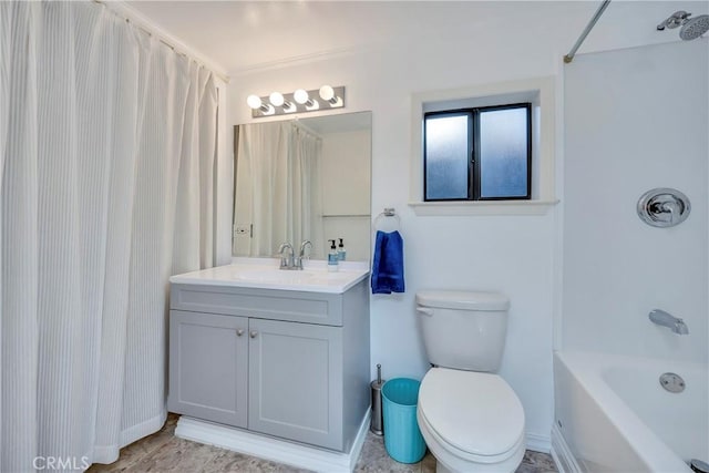 full bathroom featuring toilet, vanity, and shower / tub combo with curtain