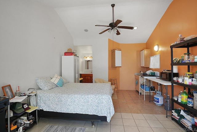 tiled bedroom featuring ceiling fan and lofted ceiling