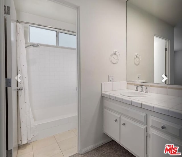 bathroom featuring vanity and tile patterned floors