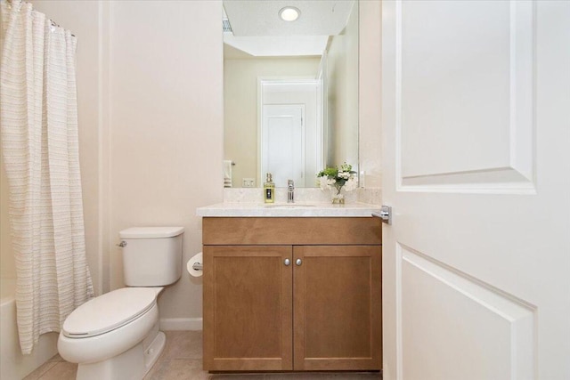 full bathroom featuring tile patterned floors, vanity, toilet, and shower / tub combo with curtain