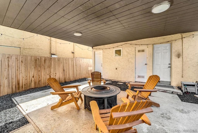 view of patio / terrace featuring a fire pit