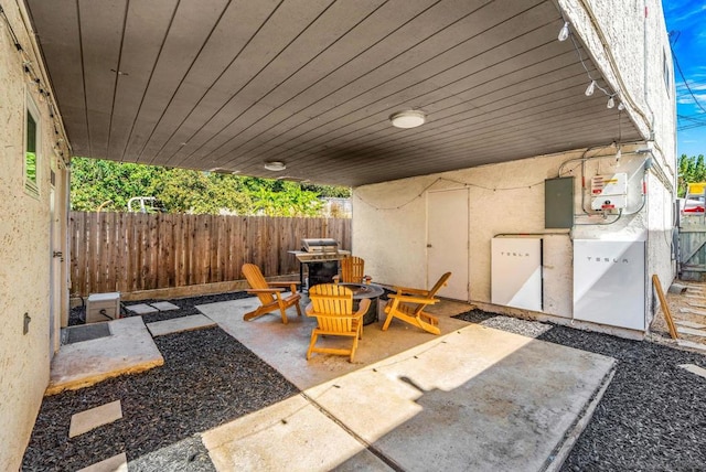 view of patio featuring electric panel