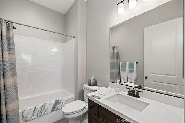 full bathroom with toilet, vanity, and shower / tub combo with curtain