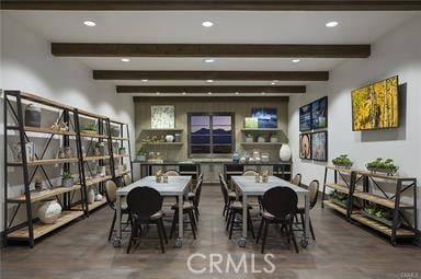 dining room featuring beamed ceiling