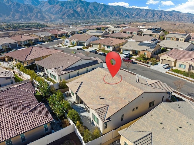 drone / aerial view featuring a mountain view