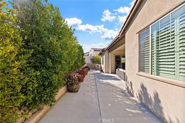 view of home's exterior featuring a patio