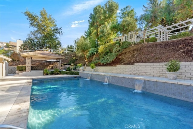 view of pool featuring a gazebo and pool water feature