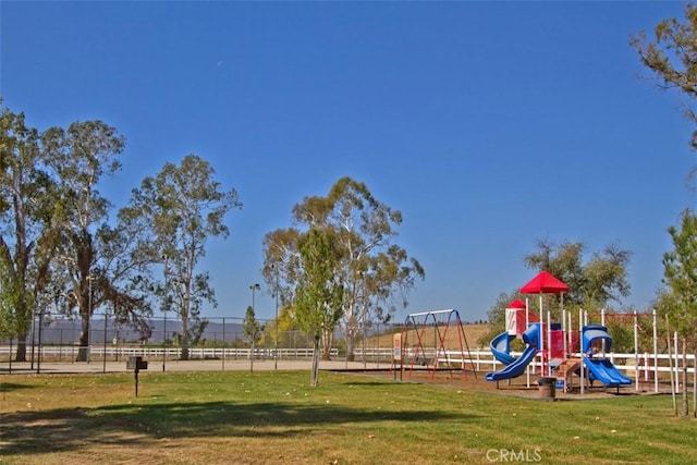 view of jungle gym with a yard