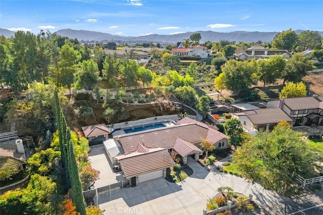 bird's eye view with a mountain view