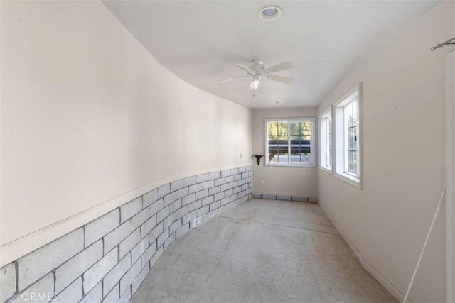 empty room featuring ceiling fan