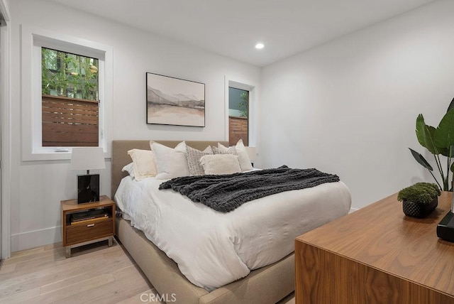 bedroom with light hardwood / wood-style flooring