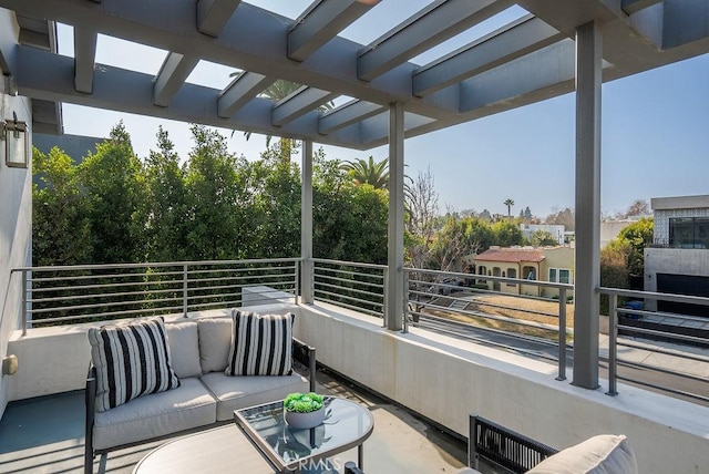 view of patio / terrace featuring an outdoor living space and a balcony