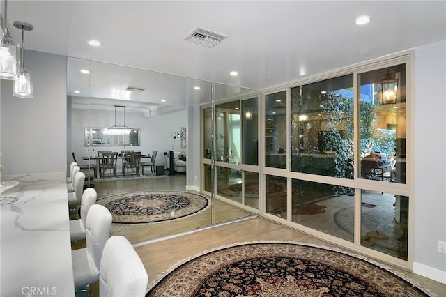 living room featuring expansive windows