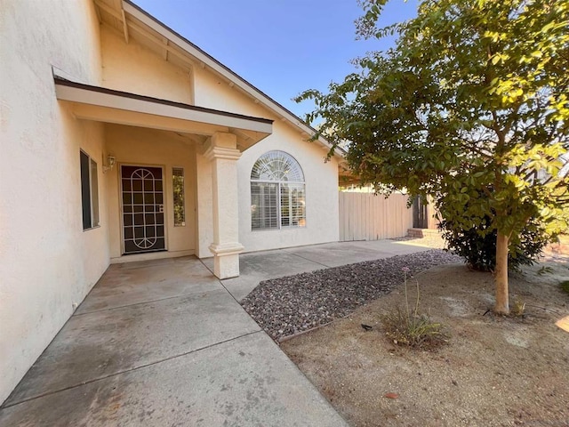 property entrance with a patio area