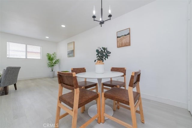 dining area with a chandelier