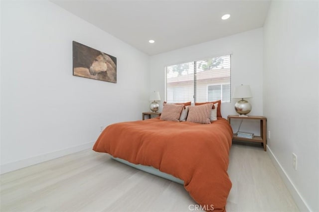 bedroom featuring light hardwood / wood-style floors