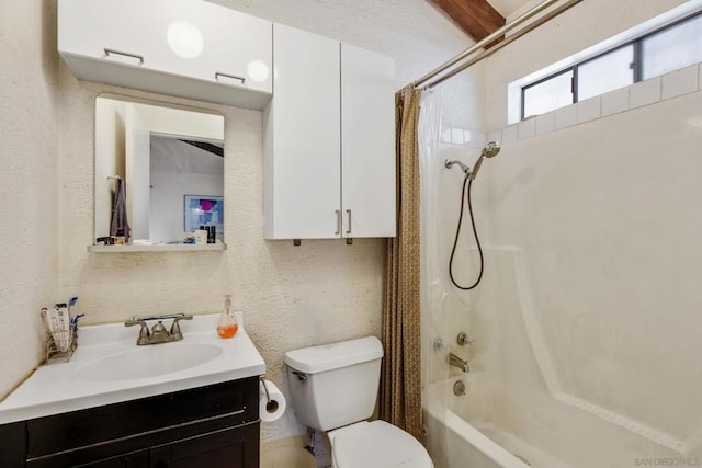 full bathroom featuring toilet, shower / bathtub combination with curtain, and vanity