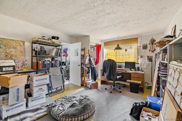 office space with a textured ceiling