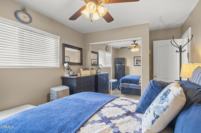 bedroom with a closet and ceiling fan