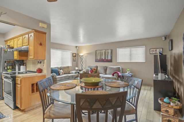 dining area featuring light hardwood / wood-style flooring