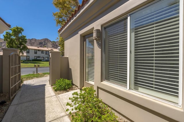 view of side of property featuring a mountain view