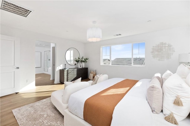 bedroom featuring hardwood / wood-style floors